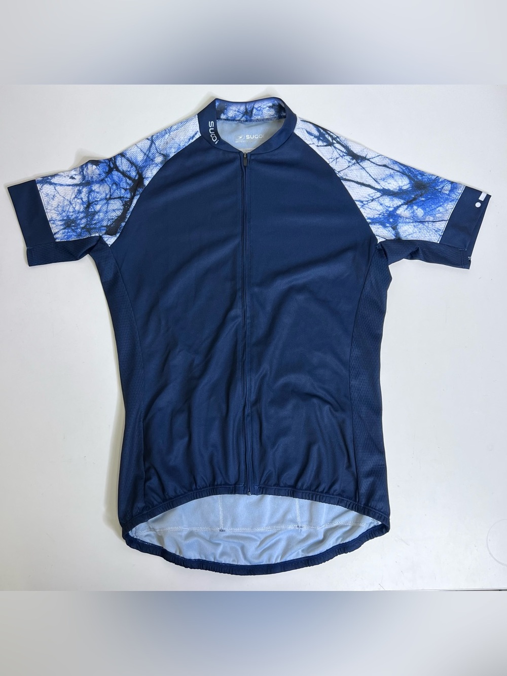 SUGOI Navy Blue Cycling Jersey with White & Blue Patterned Sleeves